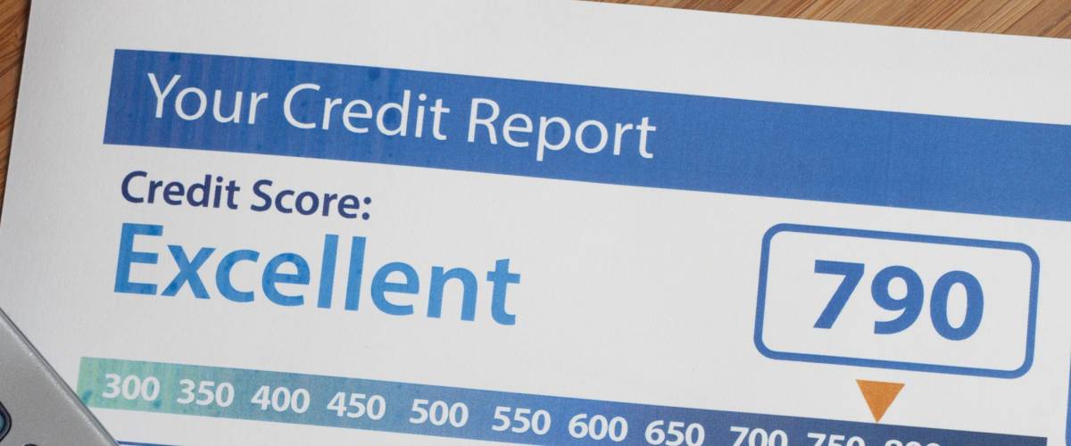 Credit report with score on a desk