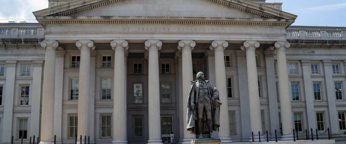 Washington, DC - August 4, 2019: Exterior of the United States Department of Treasury, with statue of Albert Gallatin, secretary of the treasury