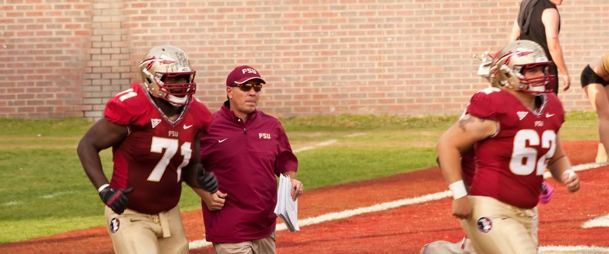 Jimbo Fisher, center, during his coaching days at Florida State