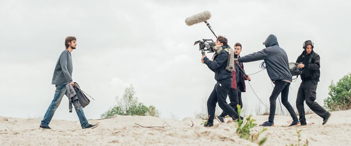 Film crew and actor making a movie