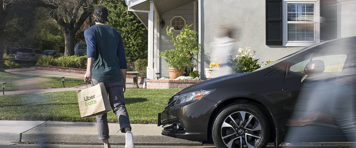 An Uber Eats delivery being made