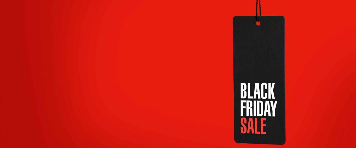 Black friday. Sale tag on the red background