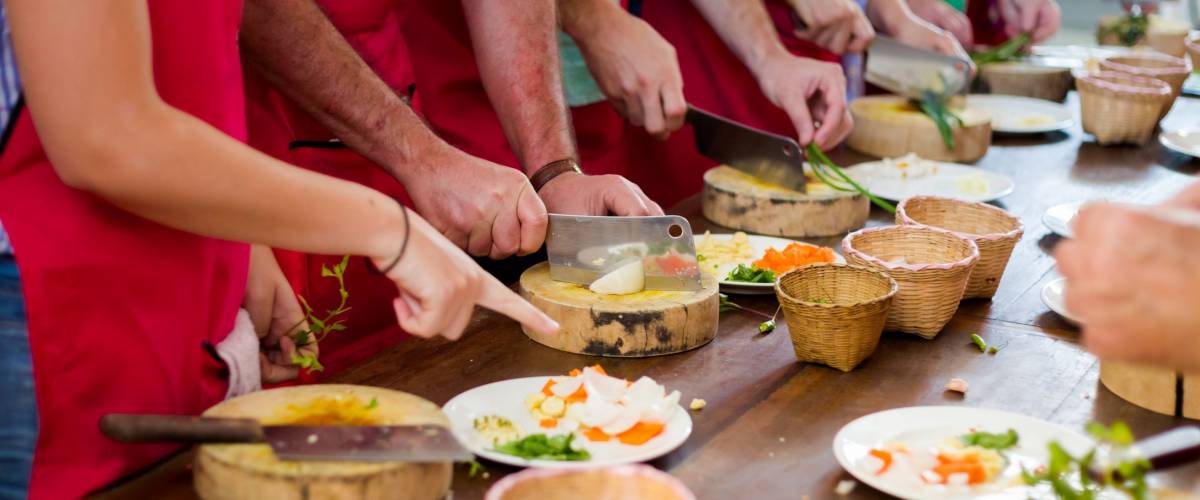 Traditional way of preparing thai food using chopper knife. Picture of traditional thai cuisine made of fresh ingredients taken during cooking class in Chiang Mai.