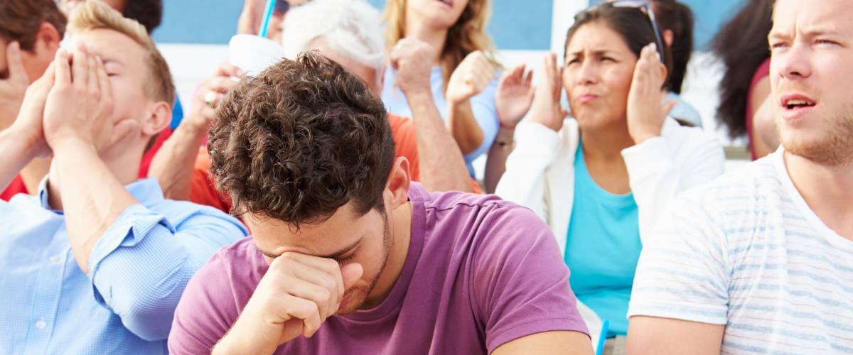 Disappointed Spectators At Outdoor Sports Event