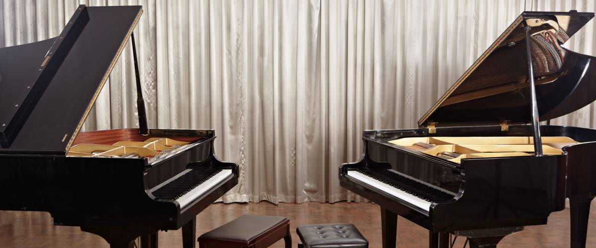 Two grand pianos on stage without no one