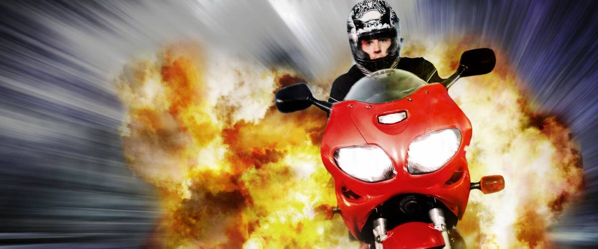 Hero on motorbike escapes explosion with blurred background, comic style edit