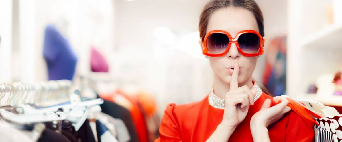 Shopping with Big Sunglasses Woman Keeping a Secret - Cool mysterious girl with shopping bags undercover