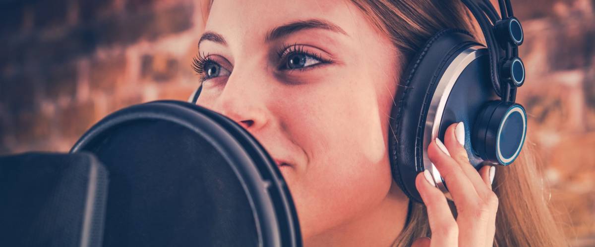 Woman Recording Audiobook. Audio Recording Studio Theme. Caucasian Voice Talent.