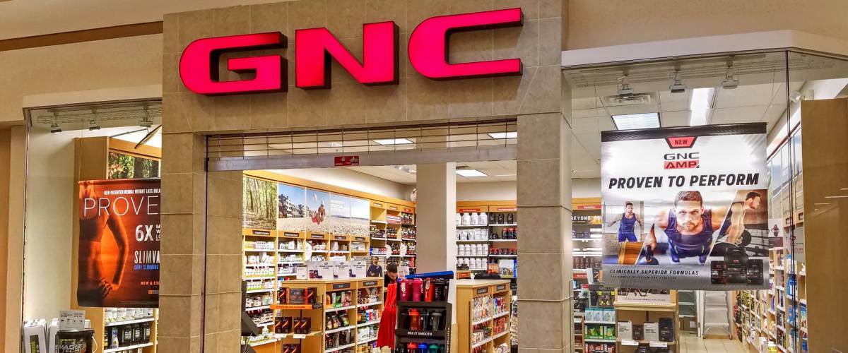 HDR image, GNC vitamin nutrition storefront, shopping mall - Woburn, Massachusetts USA - February 14, 2018