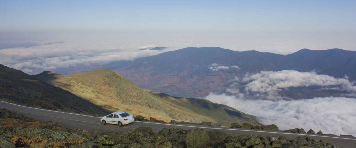 white car on the road to the summit of Mount Washington, New Hampshire USA