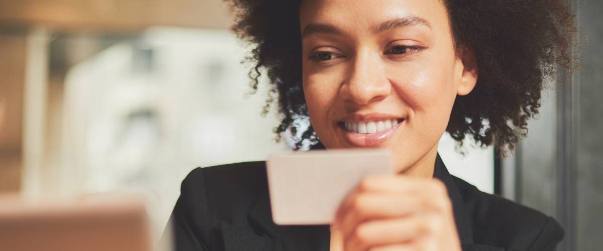 Woman holding credit card