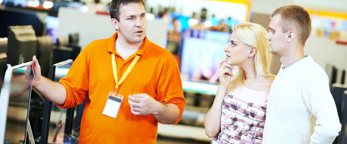 family shopping at electronics supermarket