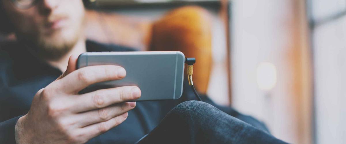 Guy watching stuff on his phone