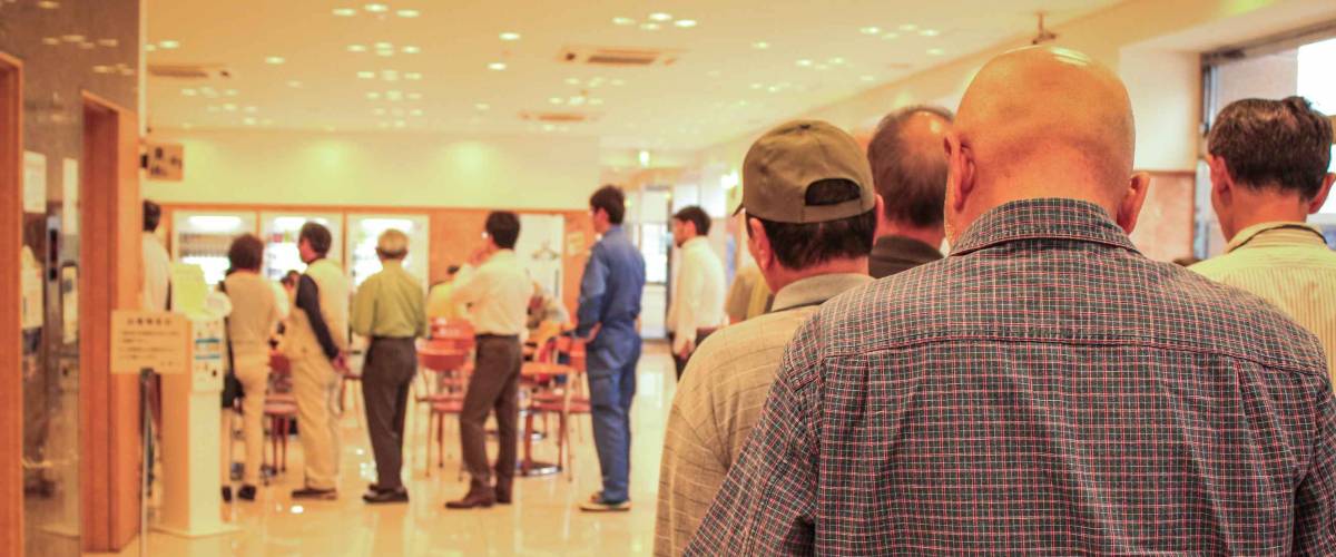 Human queue in line store