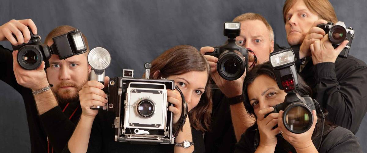 Photo of paparazzi waiting for the right moment