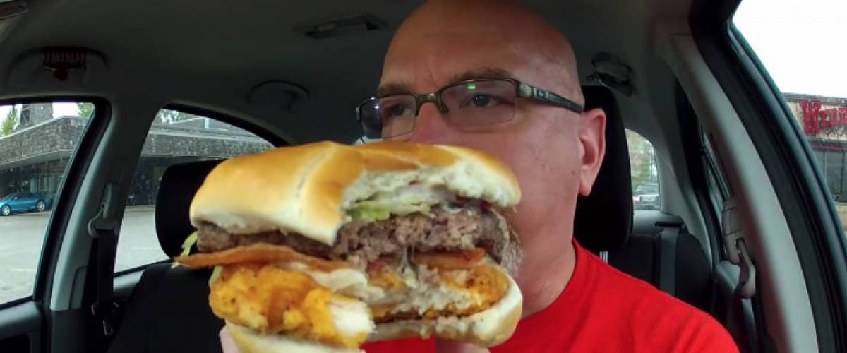 Burger with a beef patty and chicken patty