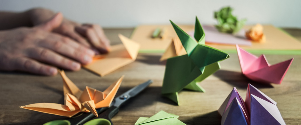 Origami, hands, colourful paper